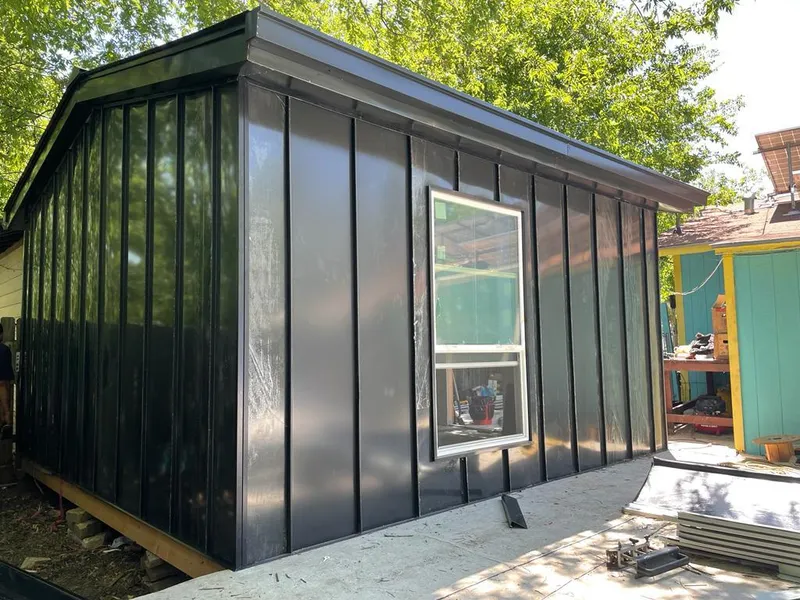 Black standing seam metal wall panels for Metal Roof Installation in Bella Vista