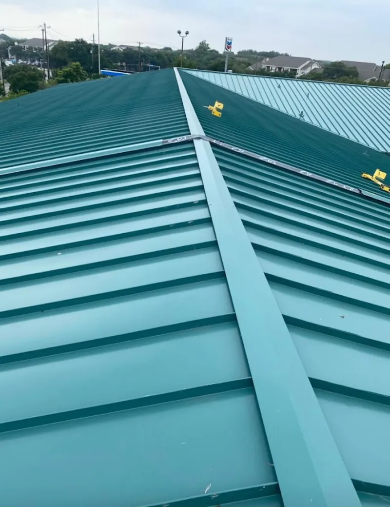 Green commercial metal roof ridge and valley for Metal Roof Repair in Bella Vista